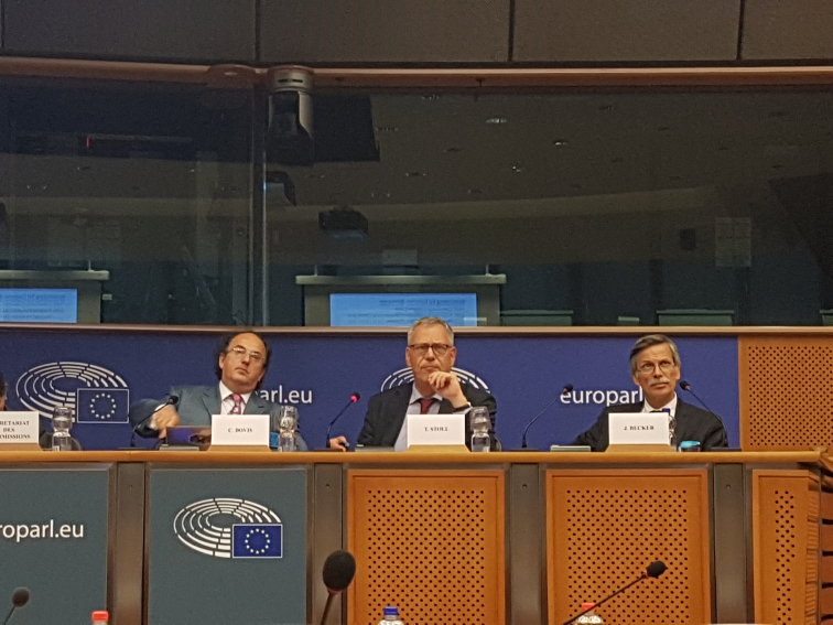 Becker (right) along with other experts in the European Parliament